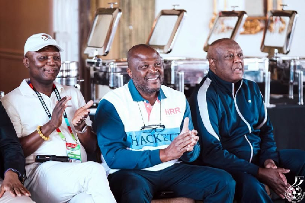 Businessman Ibrahim Mahama asnd Sports Minister Kofi Adams discusses plans for an international standard stadium in Ghana