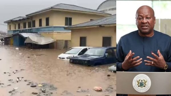 Flooded streets in Accra with submerged vehicles