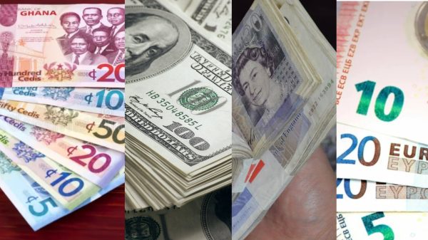 Ghana cedi notes alongside US dollar, British pound and euro currencies after the cedi's strong appreciation