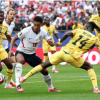 Benjamin Asare diving to make a late save as Ghana defenders block England shots in World Cup clash