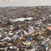 Plastic and other solid waste washed onto Laboma Beach after floodwaters carried debris through the Odaw drain following heavy rainfall in Accra.