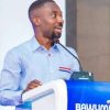 Dennis Miracles Aboagye speaking during a New Patriotic Party event before his reported EOCO arrest.