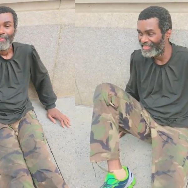 Dennis Efram speaking with a Ghanaian woman after being found on a street in the United States as she appealed for help to locate his family.