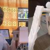 Young Ghanaian developer presenting a humanoid-inspired AI smartphone stand prototype designed to respond interactively to users