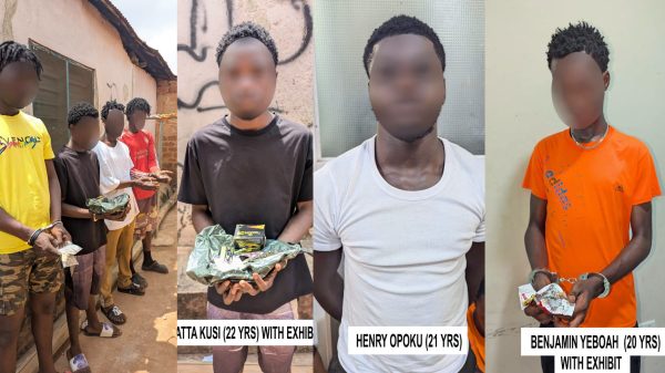 Police officers display suspected narcotics, cannabis-infused products and tramadol seized during an anti-drug operation in Kumasi.