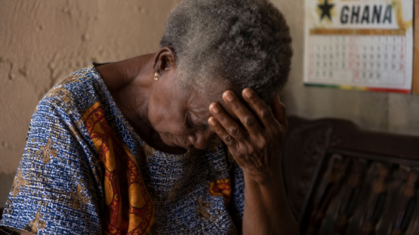 Illustrative photo of an elderly woman reflecting quietly as she faces the challenges of dementia.