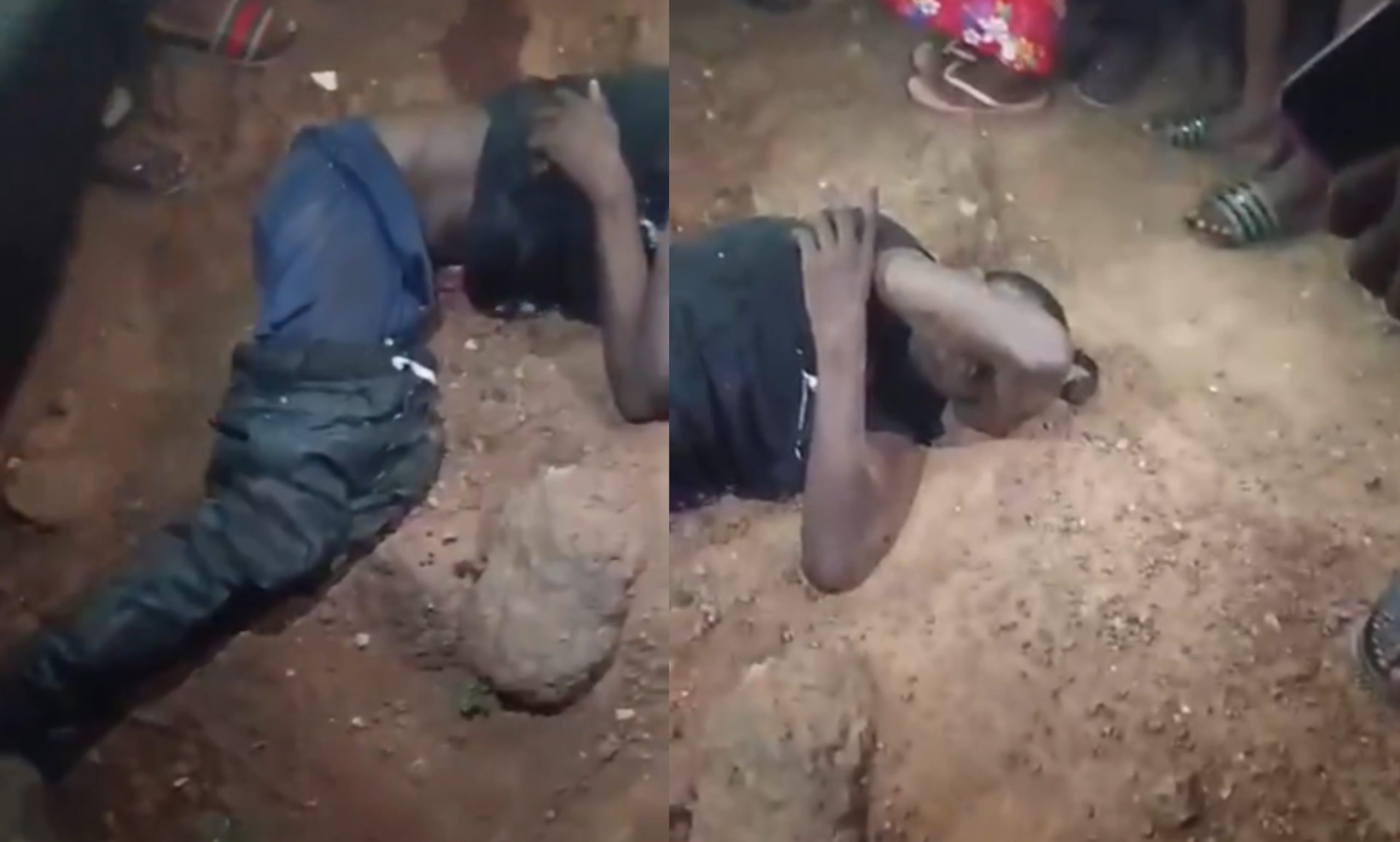 One of the suspected armed robbers lying on the floor, surrounded by residents, after being severely injured when iron rods protruding from a nearby building pierced his body
